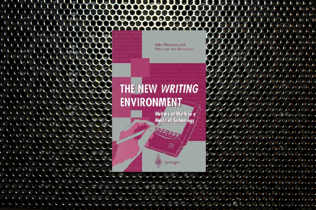 The new writing environment cover image with a black dotted background